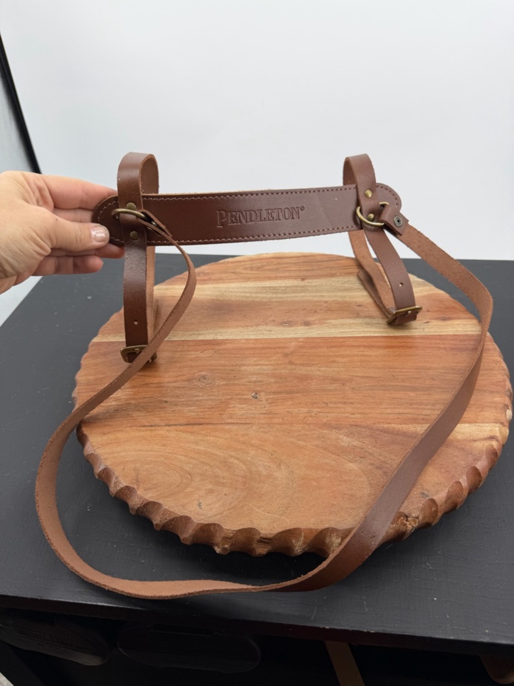 Pendleton brown leather blanket roll carry strap logo embossed handle